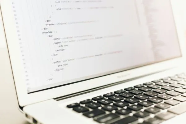 Source code on a developer's laptop screen